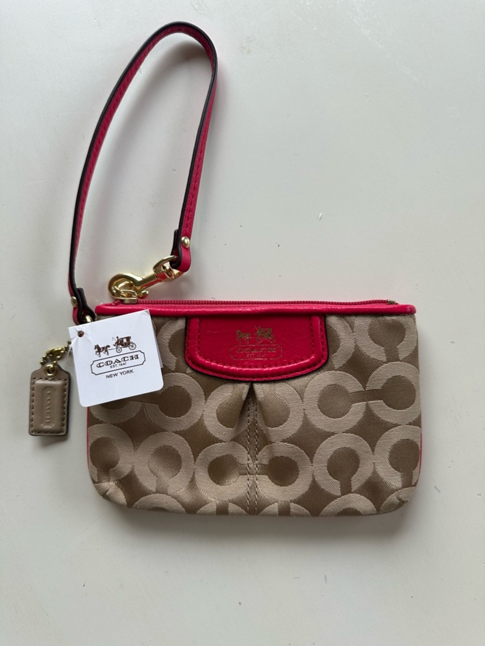 Coach Beige Signature Canvas Wristlet with Pink Trim and Strap